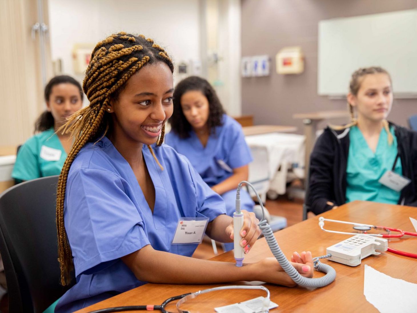 participant of summer institute tests medical equipment